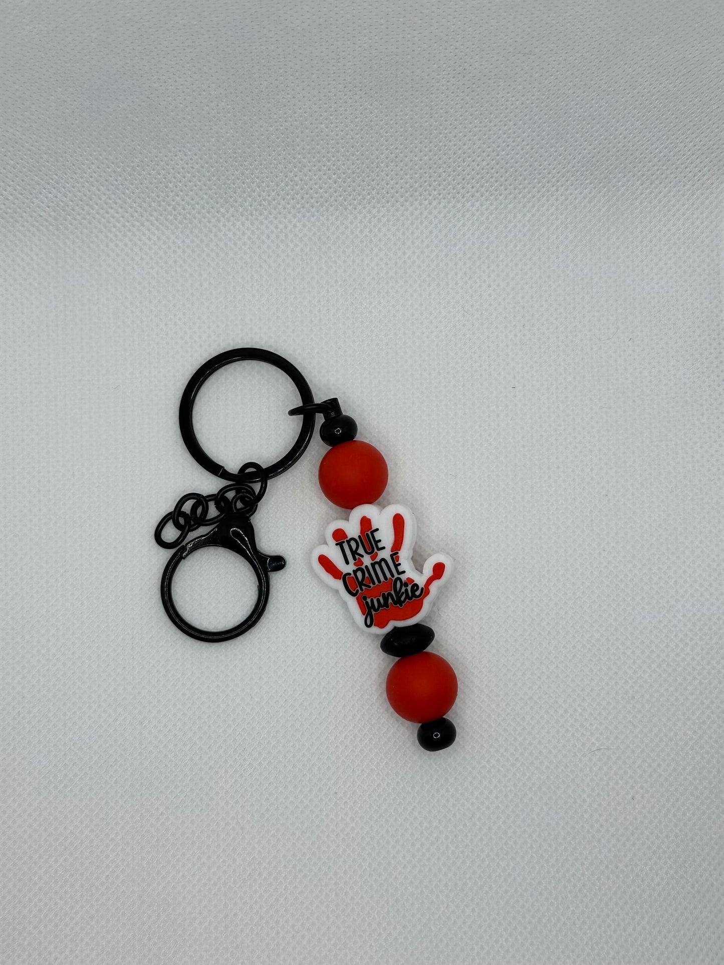 True Crime Junkie Silicone Bead Black Metal Keychain
