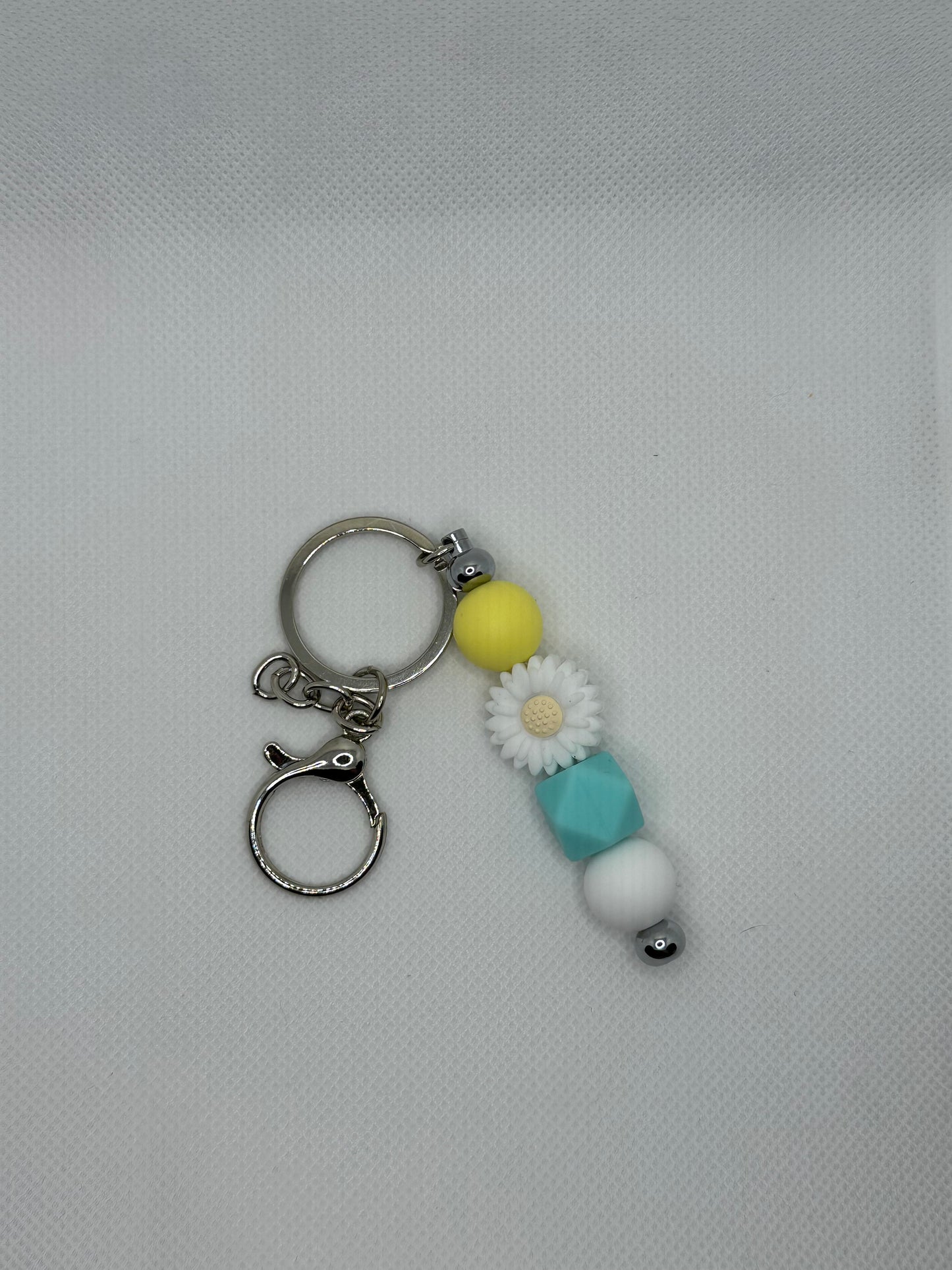 White Daisy And Light Blue Silver Metal Keychain