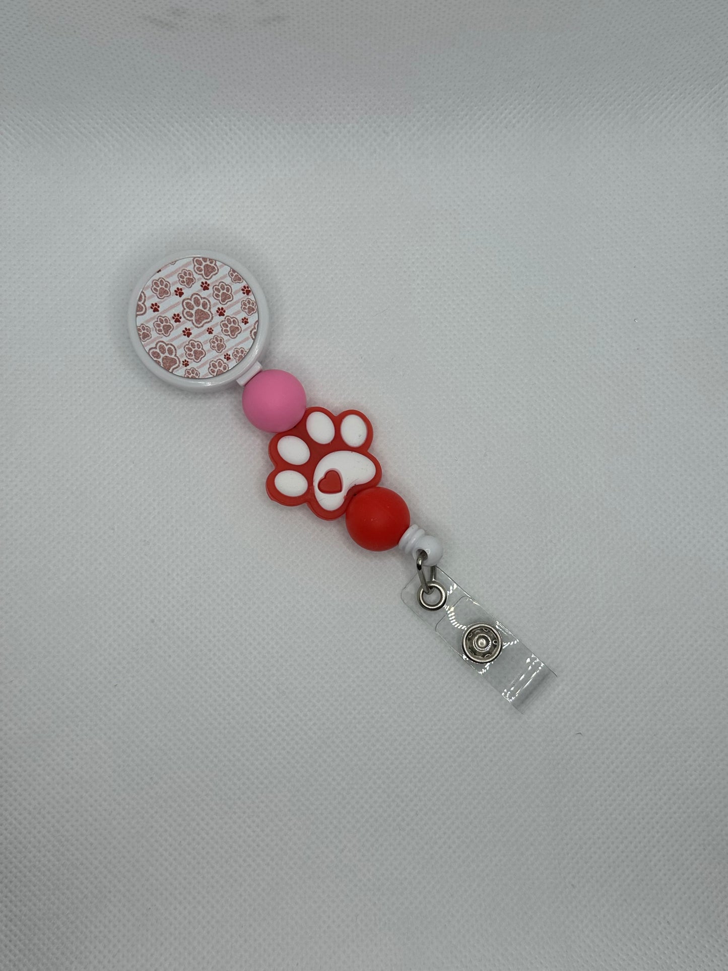 Pink Glitter Paw Print White Badge Reel