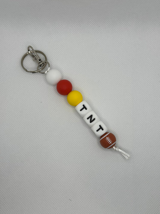 TNT Taylor And Travis Football Large Silicone Bead Keychain