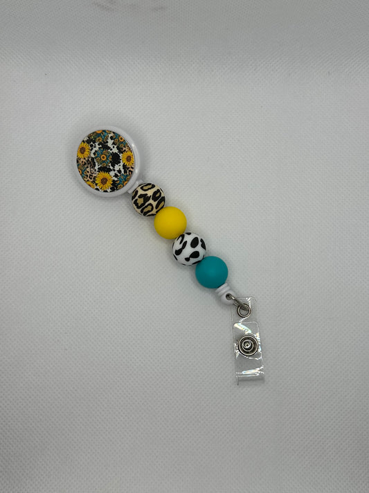 Sunflower And Cow White Badge Reel
