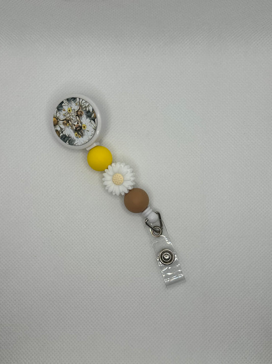 Daisy And Highland Cow White Badge Reel